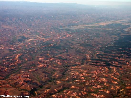 Bird's eye view of deforestation in Madagascar (Airplane flight from Anatananarivo to Maroantsetra)