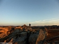 Rhett atop cliff in Isalo at sunrise (Isalo)