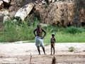 Sakalava father and son on beach of Manambolo (Manambolo)