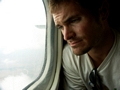 Rhett looking out plane window (Tulear)