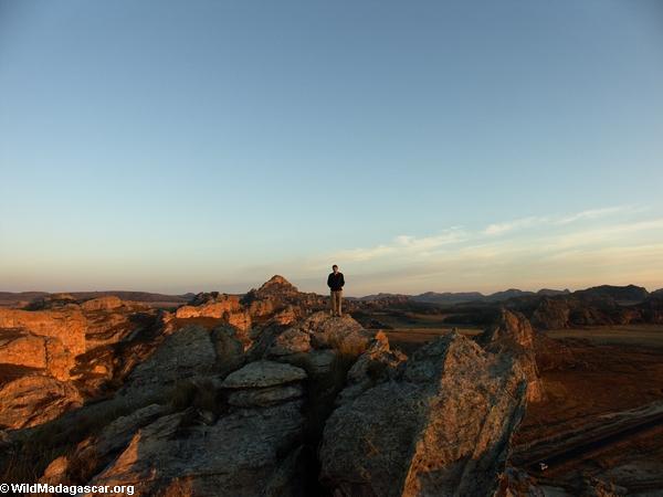 Rhett atop cliff in Isalo at sunrise (Isalo)